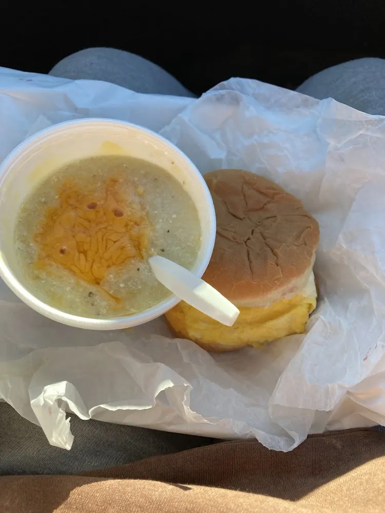 Cheese and Grits with a Sausage Egg and Cheese on a Bun